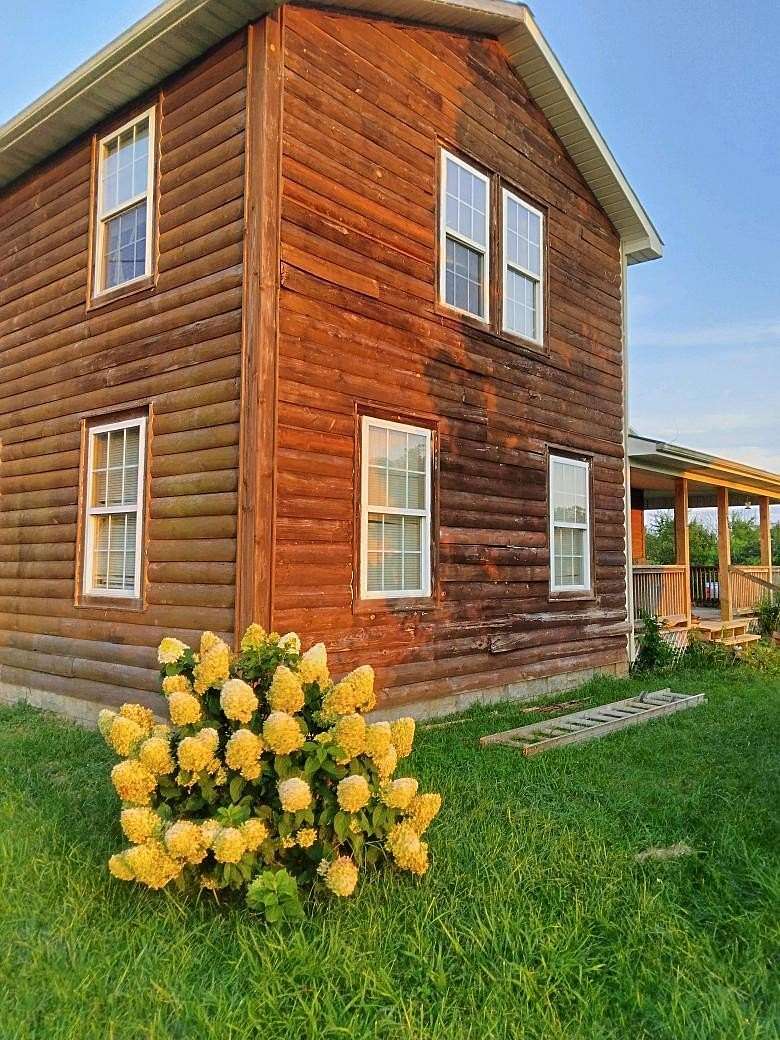 8.84 Acres of Residential Land with Home for Sale in Greensburg, Kentucky