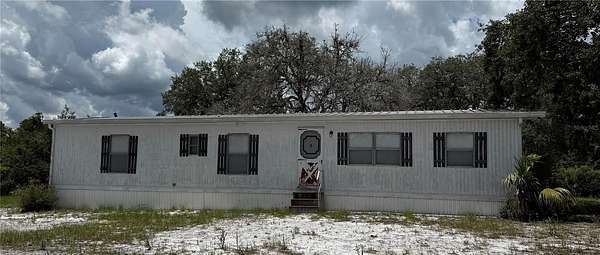 5.73 Acres of Residential Land with Home for Sale in Eustis, Florida