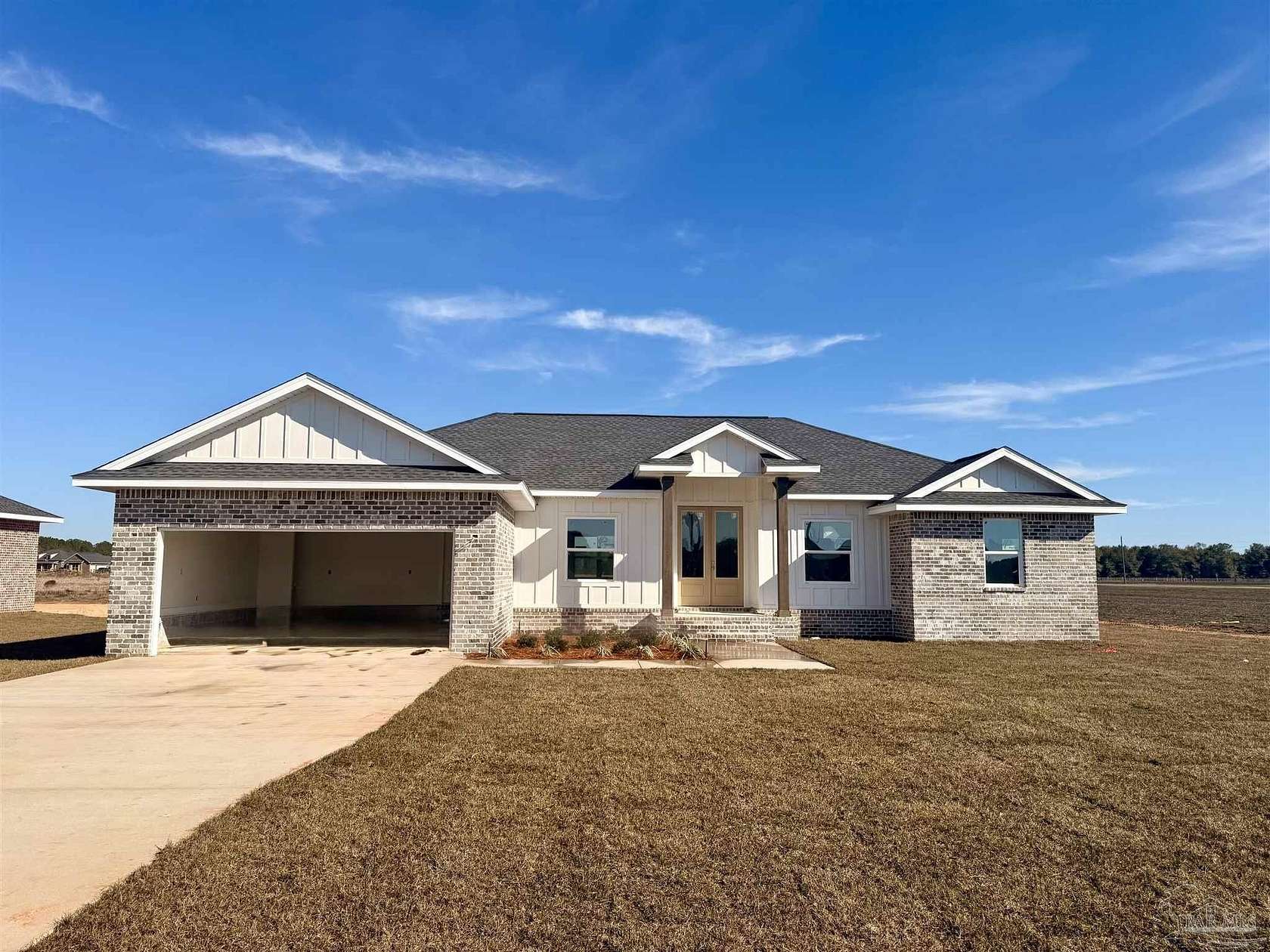 1.5 Acres of Land with Home for Sale in Pace, Florida