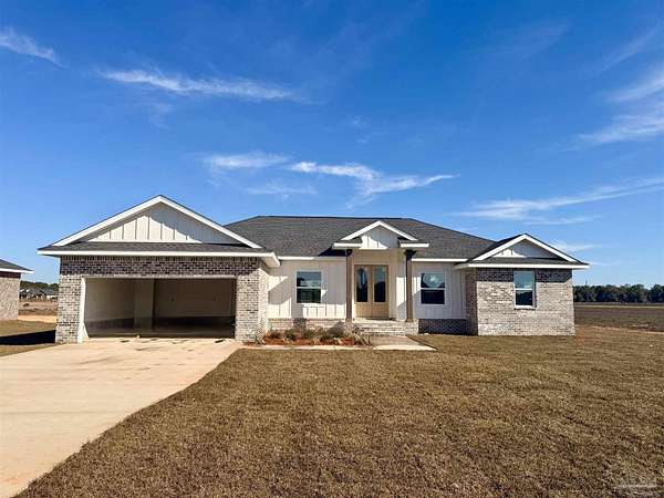 1.5 Acres of Residential Land with Home for Sale in Pace, Florida