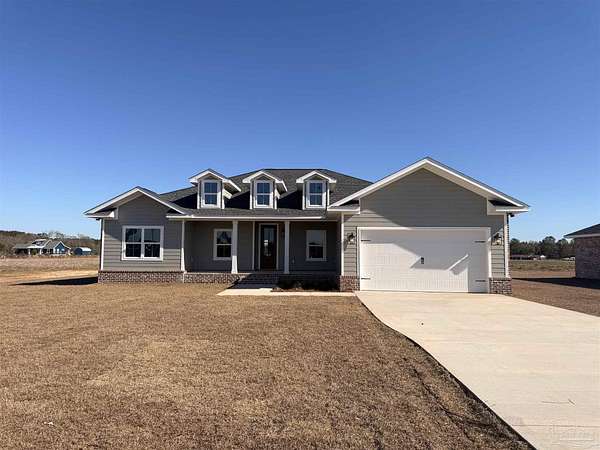 1.5 Acres of Residential Land with Home for Sale in Pace, Florida