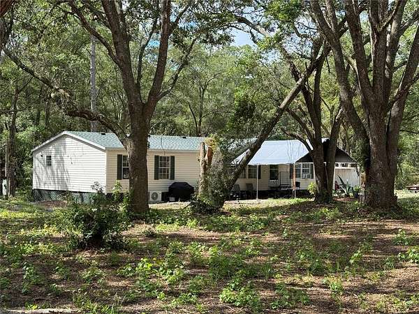 3 Acres of Residential Land with Home for Sale in Ocklawaha, Florida