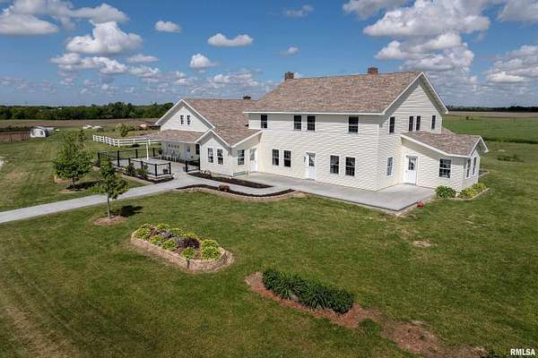 28 Acres of Land with Home for Sale in Revere, Missouri