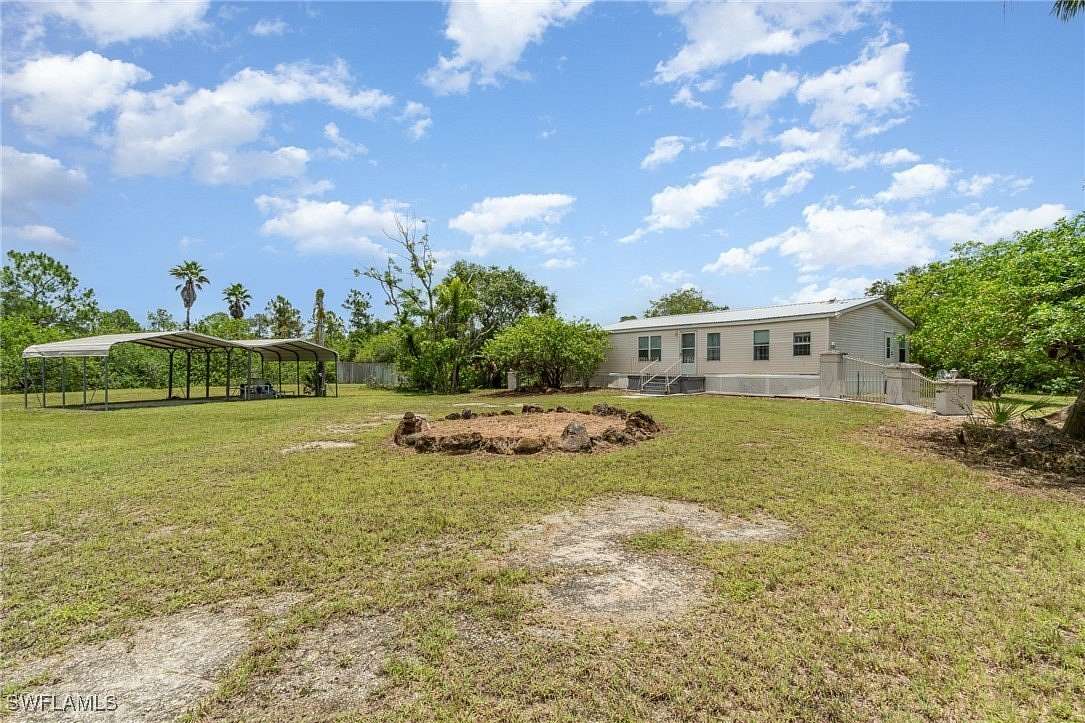 2.77 Acres of Residential Land with Home for Sale in Clewiston, Florida