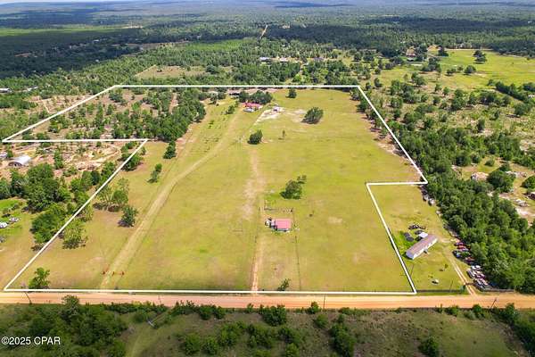32 Acres of Agricultural Land with Home for Sale in Fountain, Florida