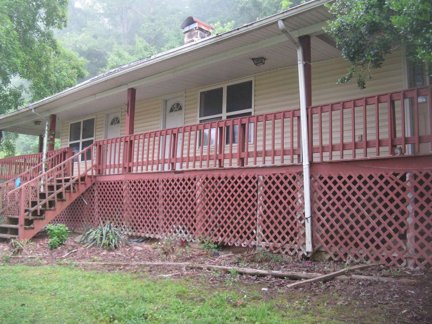 39 Acres of Agricultural Land with Home for Sale in Oneida, Kentucky