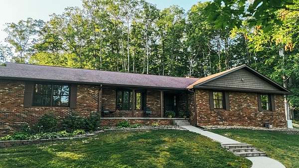 20.8 Acres of Land with Home for Sale in Louisa, Kentucky