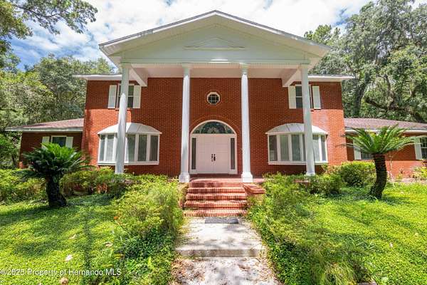 2.5 Acres of Residential Land with Home for Sale in Brooksville, Florida