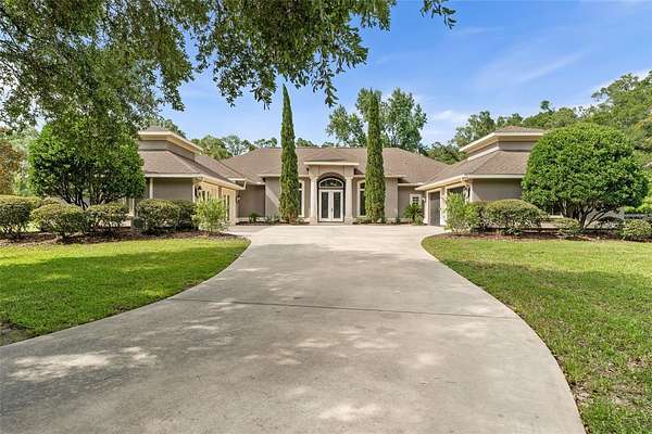 5.14 Acres of Land with Home for Sale in Newberry, Florida