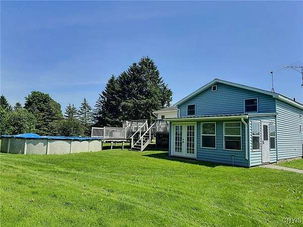 3 Acres of Residential Land with Home for Sale in Venice Town, New York