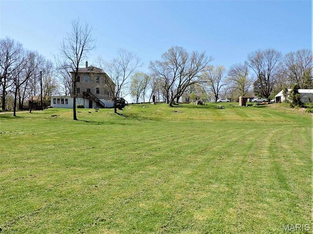 1.6 Acres of Residential Land with Home for Sale in Morse Mill, Missouri