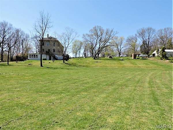 1.6 Acres of Residential Land with Home for Sale in Morse Mill, Missouri