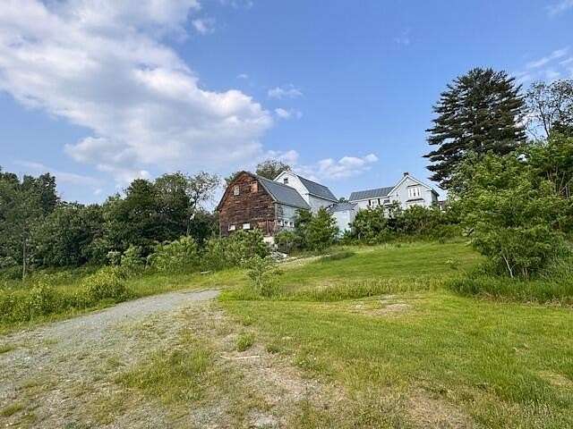 5.8 Acres of Residential Land with Home for Sale in Madison, Maine