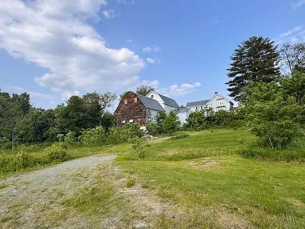 5.8 Acres of Residential Land with Home for Sale in Madison, Maine