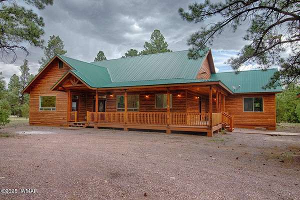 3 Acres of Residential Land with Home for Sale in Nutrioso, Arizona