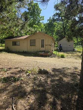 0.66 Acres of Residential Land with Home for Sale in Harrison, Michigan