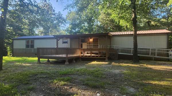 3 Acres of Residential Land with Home for Sale in Story, Arkansas
