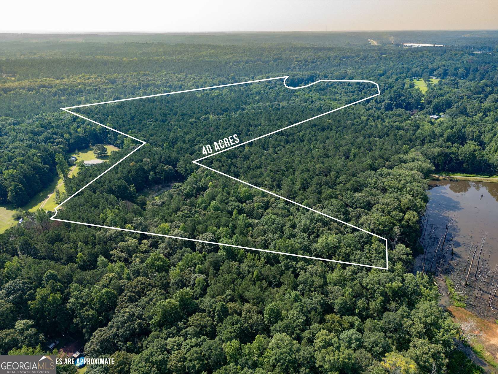 40 Acres of Recreational Land with Home for Sale in Forsyth, Georgia