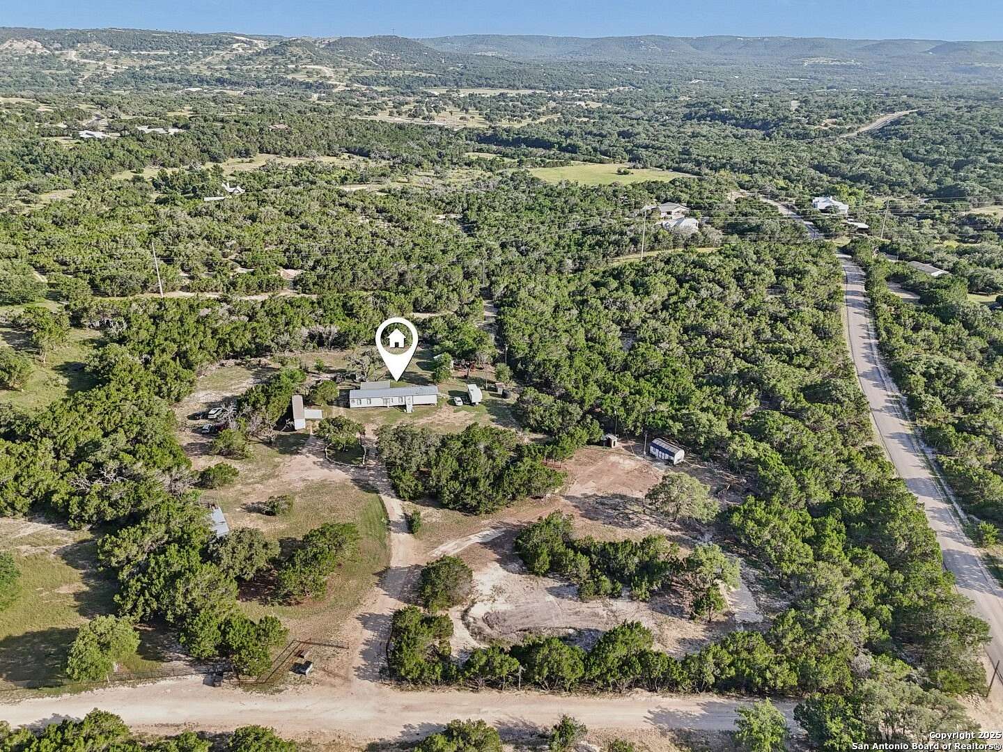 12 Acres of Land with Home for Sale in Pipe Creek, Texas