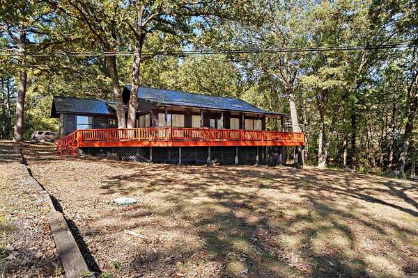 2.49 Acres of Land with Home for Sale in Fairfield Bay, Arkansas