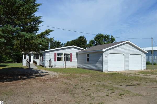 3 Acres of Residential Land with Home for Sale in Rapid City, Michigan