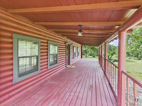28.1 Acres of Recreational Land with Home for Sale in Avinger, Texas