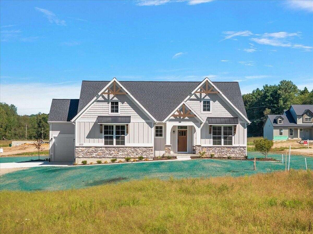 3.3 Acres of Land with Home for Sale in Lowell, Michigan