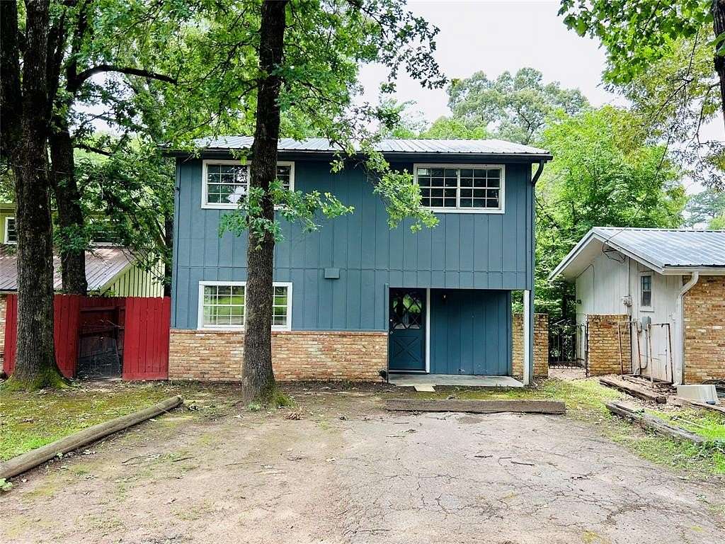 1.56 Acres of Land for Sale in Avinger, Texas