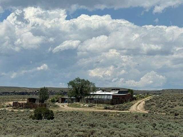 2.5 Acres of Residential Land with Home for Sale in Arroyo Hondo, New Mexico