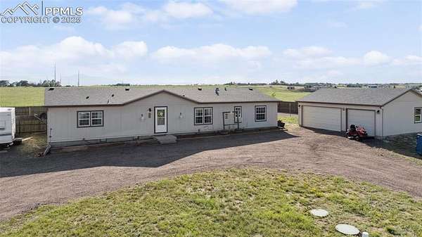 2.5 Acres of Residential Land with Home for Sale in Peyton, Colorado