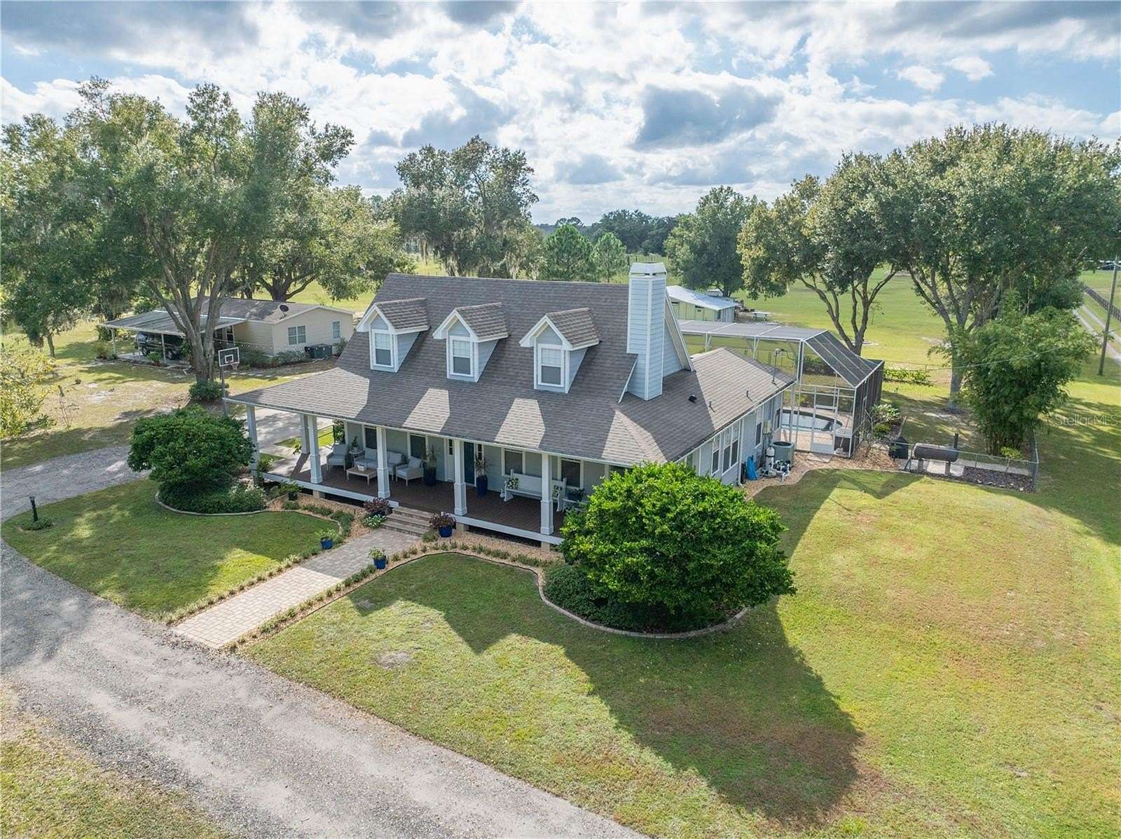 10 Acres of Residential Land with Home for Sale in Polk City, Florida