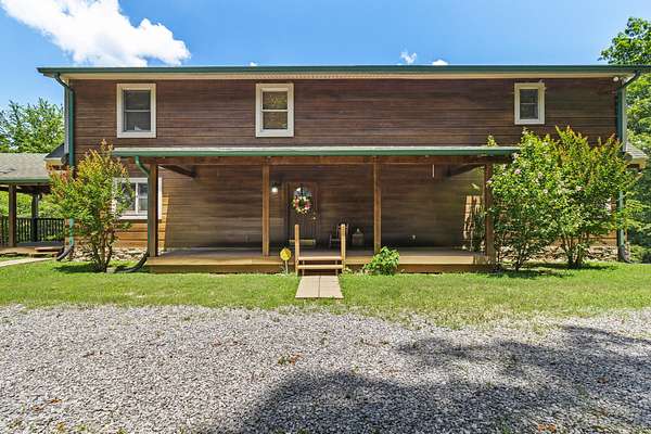 5.57 Acres of Residential Land with Home for Sale in Harrison, Tennessee