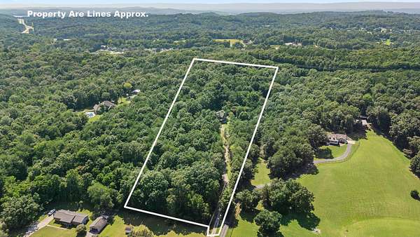 5.57 Acres of Residential Land with Home for Sale in Harrison, Tennessee