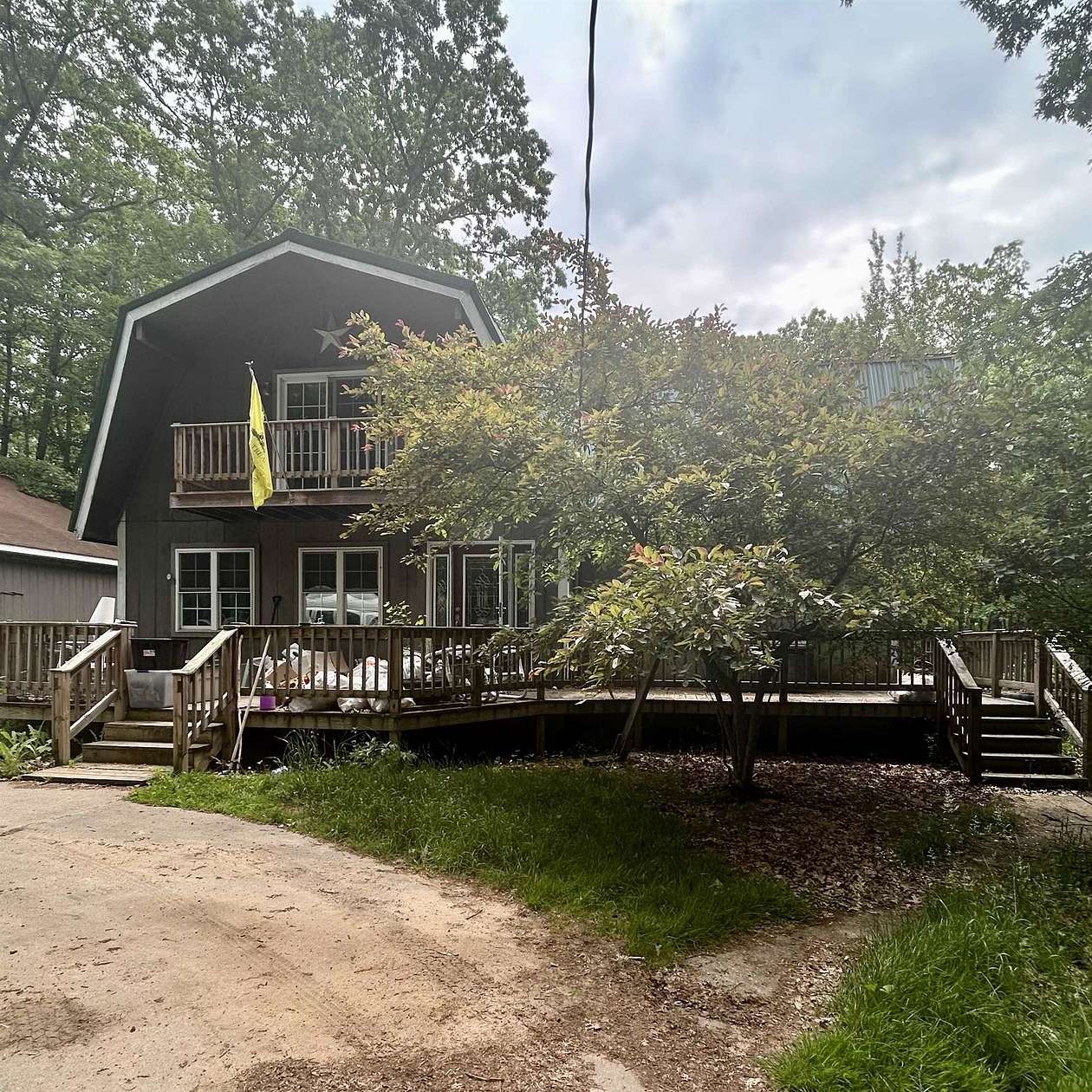 7.4 Acres of Residential Land with Home for Sale in Farwell, Michigan