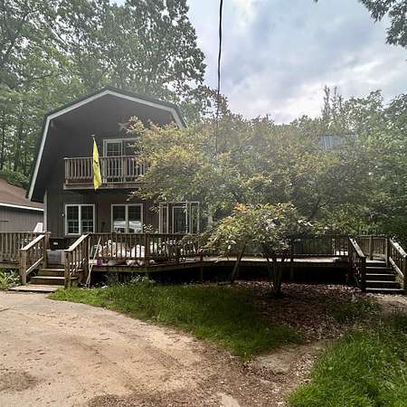 7.4 Acres of Residential Land with Home for Sale in Farwell, Michigan