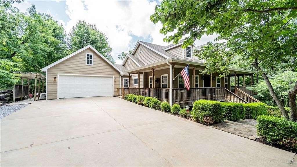 6.4 Acres of Residential Land with Home for Sale in Elkins, Arkansas