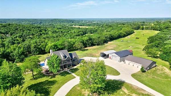 42 Acres of Land with Home for Sale in Oak Grove, Missouri