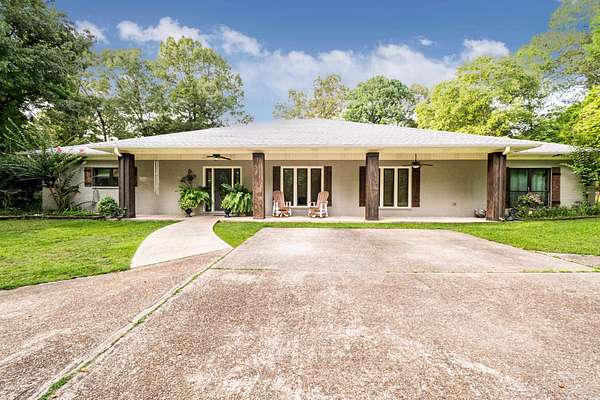 21.7 Acres of Land with Home for Sale in El Dorado, Arkansas