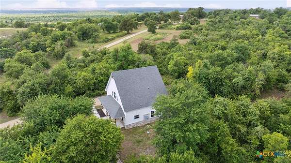 12.3 Acres of Land with Home for Sale in Rogers, Texas