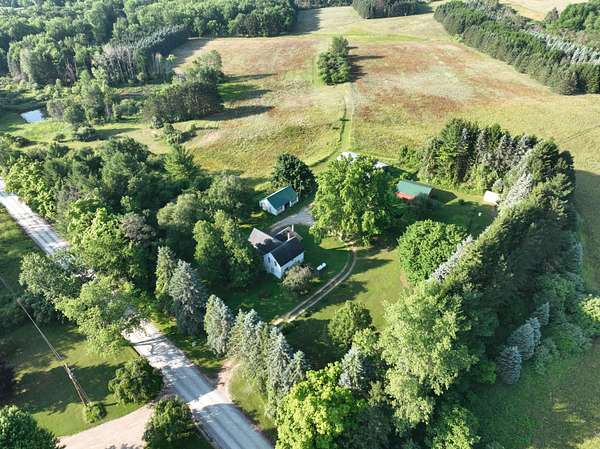 56 Acres of Land with Home for Sale in Six Lakes, Michigan