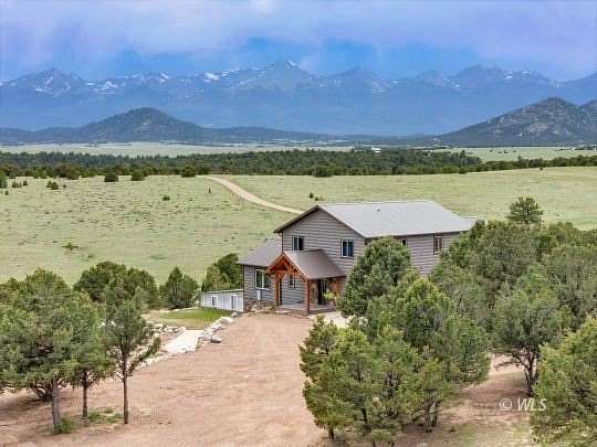 35.2 Acres of Recreational Land with Home for Sale in Cotopaxi, Colorado