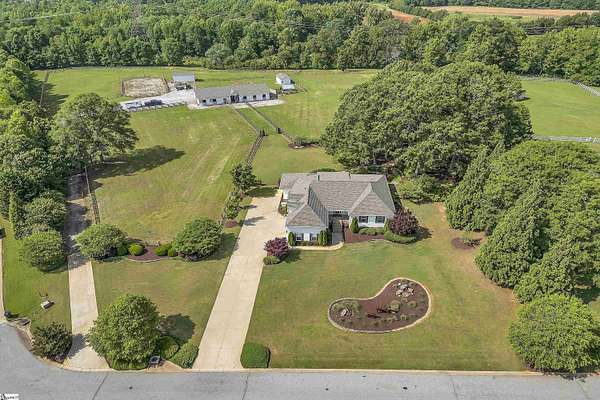 8.45 Acres of Land with Home for Sale in Pelzer, South Carolina