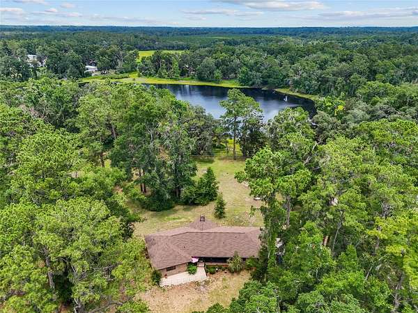 12.3 Acres of Land with Home for Sale in Live Oak, Florida