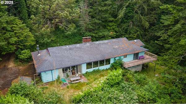 3.16 Acres of Land with Home for Sale in North Bend, Oregon