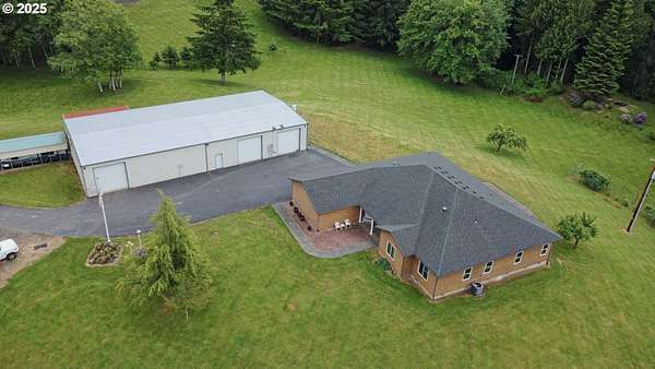 6.8 Acres of Residential Land with Home for Sale in Clatskanie, Oregon