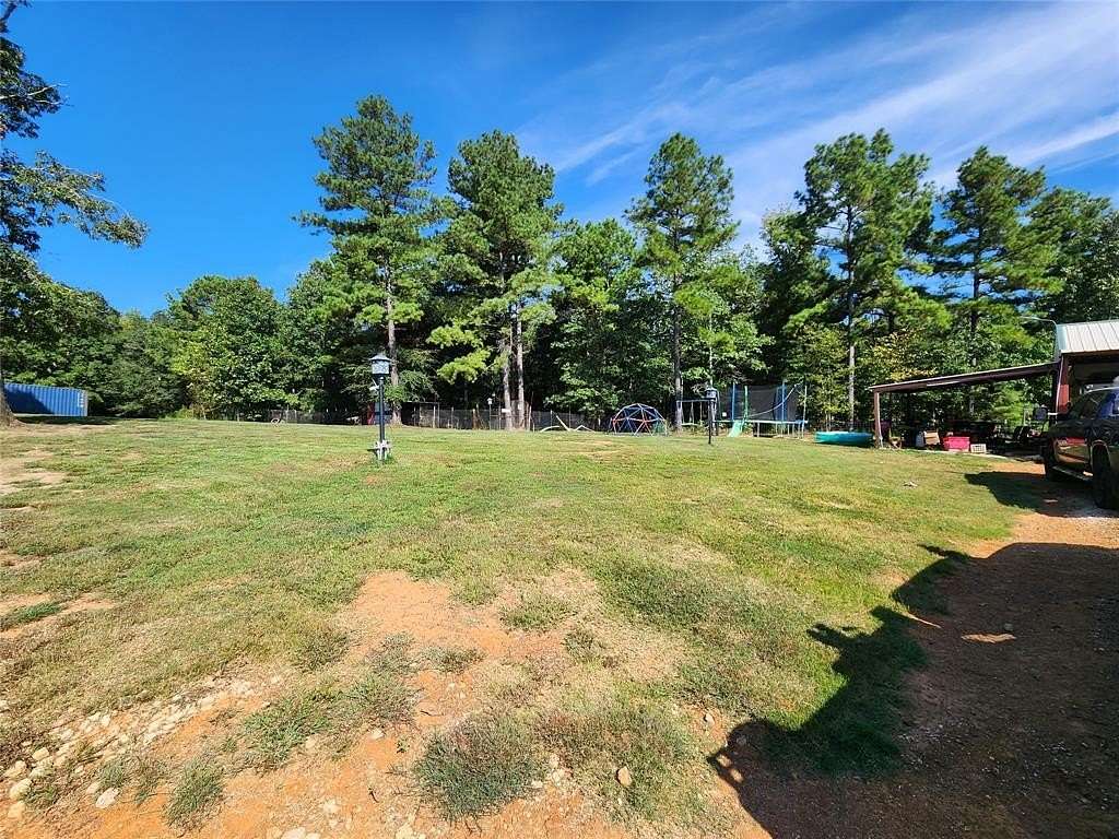 12.7 Acres of Land with Home for Sale in Timpson, Texas