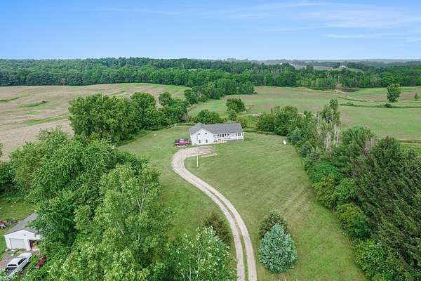 10.6 Acres of Land with Home for Sale in North Adams, Michigan