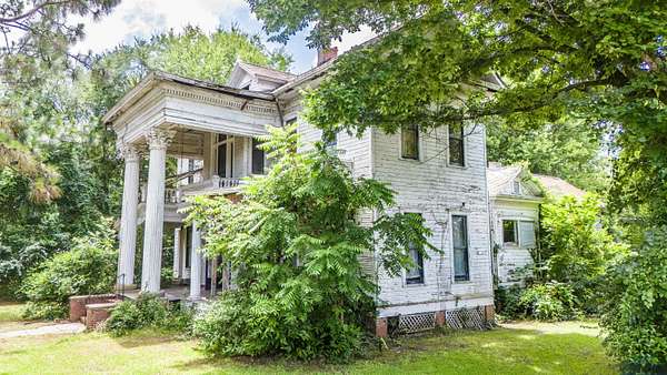 1.55 Acres of Residential Land with Home for Sale in Waskom, Texas