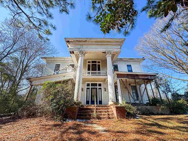 1.55 Acres of Residential Land with Home for Sale in Waskom, Texas