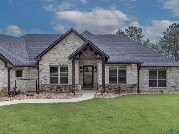 13.4 Acres of Land with Home for Sale in Tatum, Texas